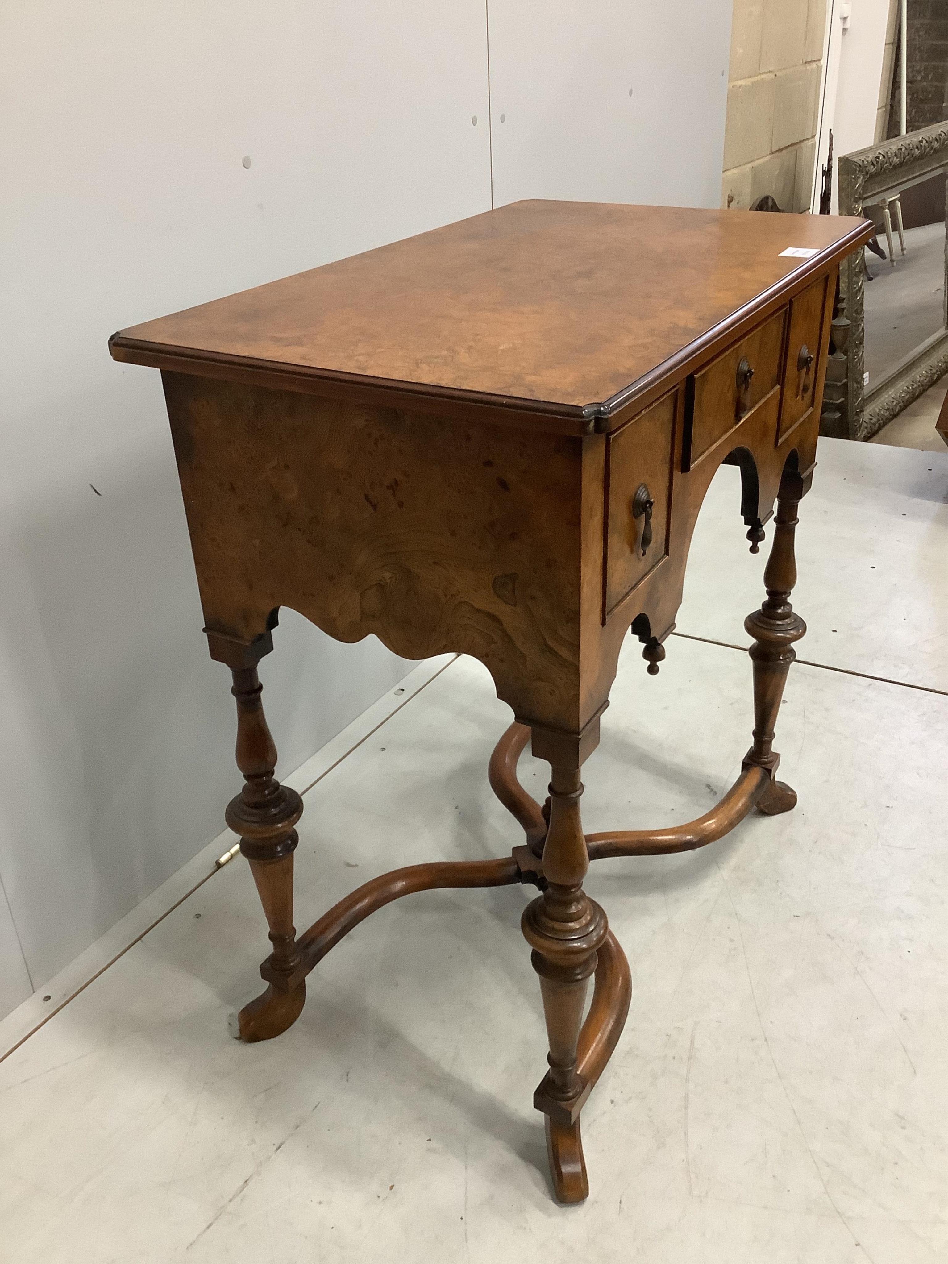 A Queen Anne style burr elm lowboy, width 76cm, depth 46cm, height 84cm. Condition - good